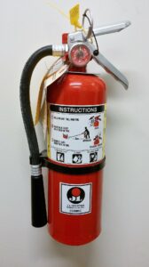 fire extinguisher mounted to wall