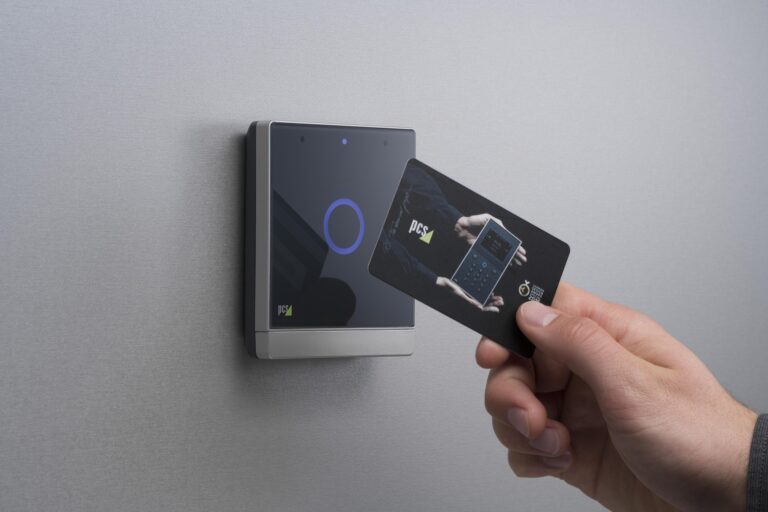 person tapping card on lock for access control systems