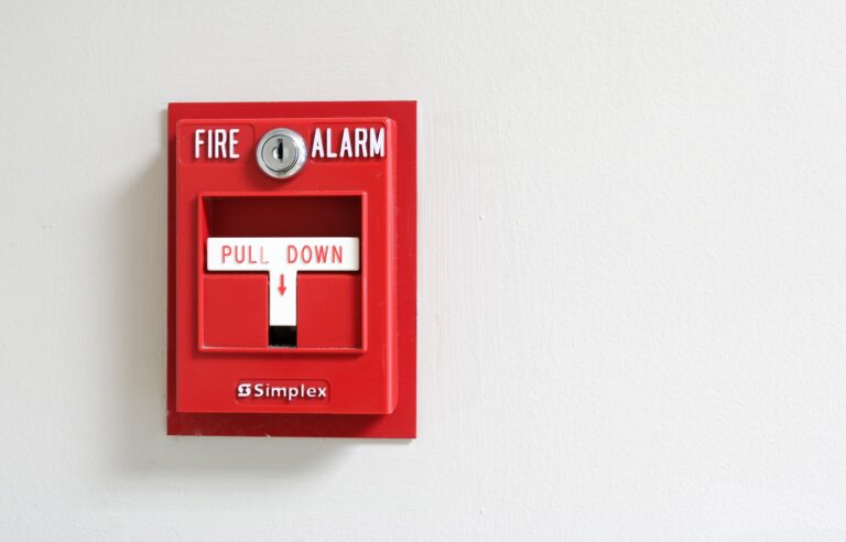 fire alarm systems pull down alarm on wall