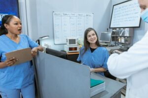 Nurses at station with nurse call systems