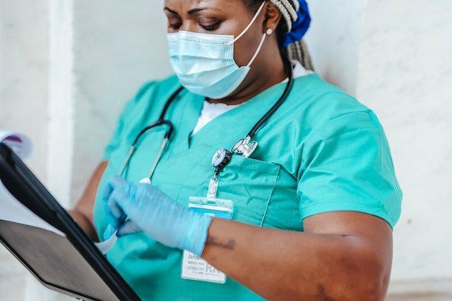 Nurse checking wireless nurse call system